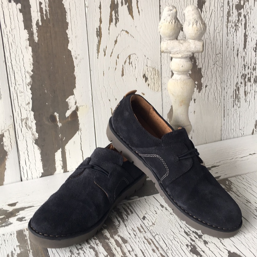 Navy blue suede Clark’s slip on